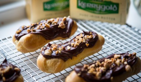 Chocolate eclairs, an all time classic with a twist - roasted hazelnuts add a lovely texture and nutty taste. Makes 12