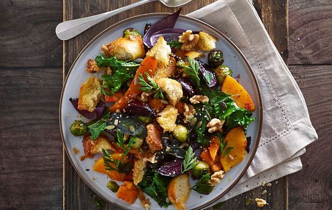 Classic Italian panzanella is actually made with stale bread, so this is a fantastic way of using up your stale bread. We're using roasted root vegetables for this winter salad, with the added crunch of walnuts. 