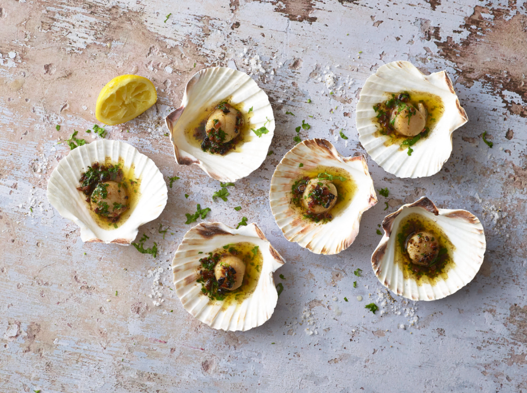 Baked Scallops with a Black Garlic, Bacon Crumb and Parsley Butter